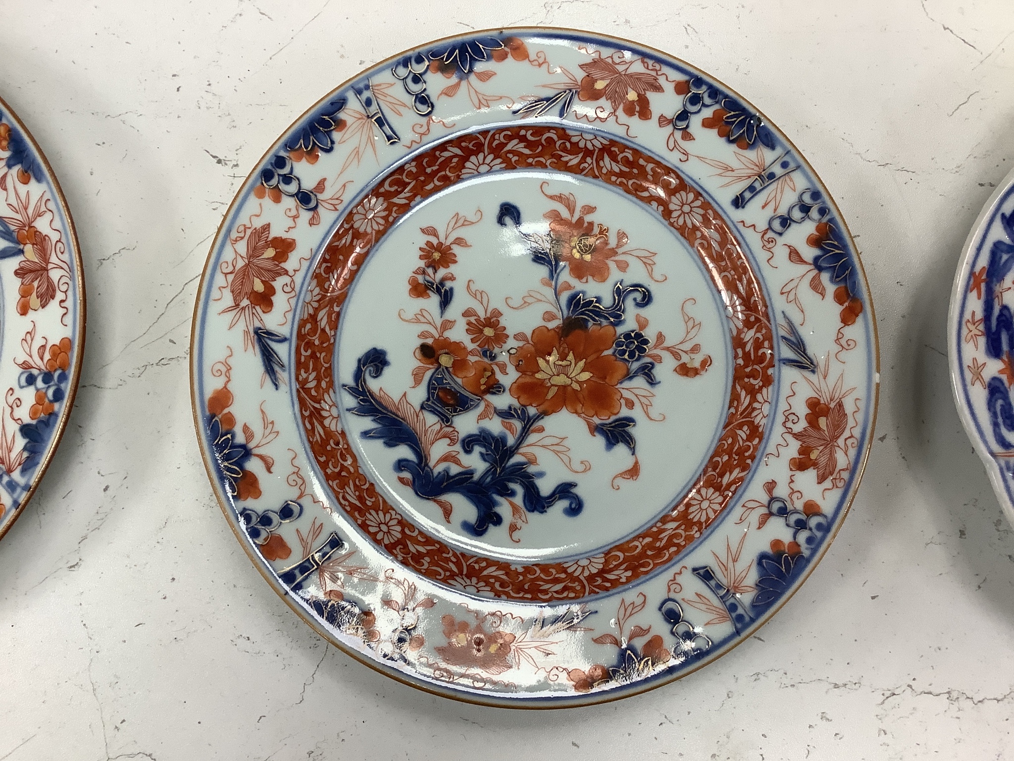 Three 18th century Chinese Imari plates and two 19th century Japanese Imari plates